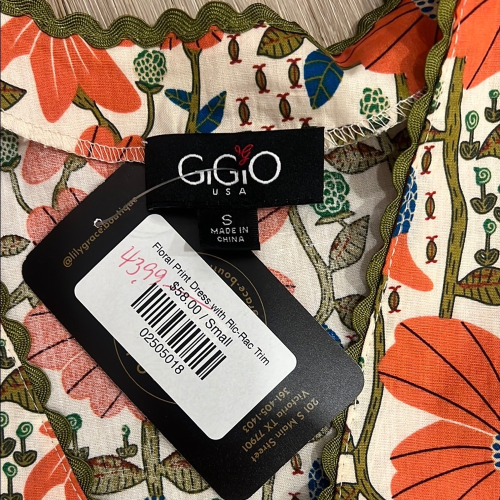 GiGio Floral Patterned Dress with Puff Sleeves and ric rac. Size small. New - Picture 2 of 3